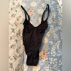 SKIMS bodysuit. Thong back. With FLAW